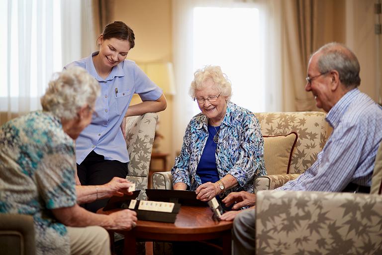 Group of residents playing a game Group of residents playing a game